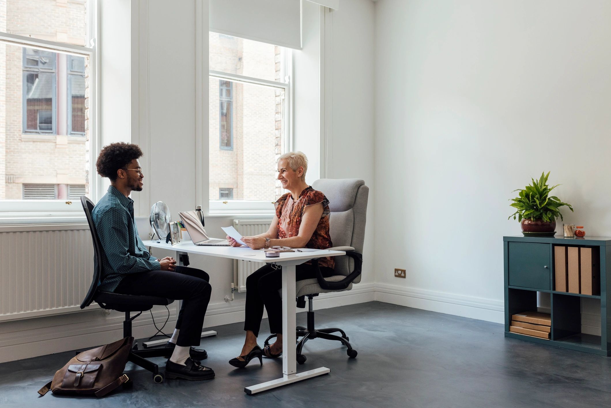 Business owner in a one-on-one office discussion