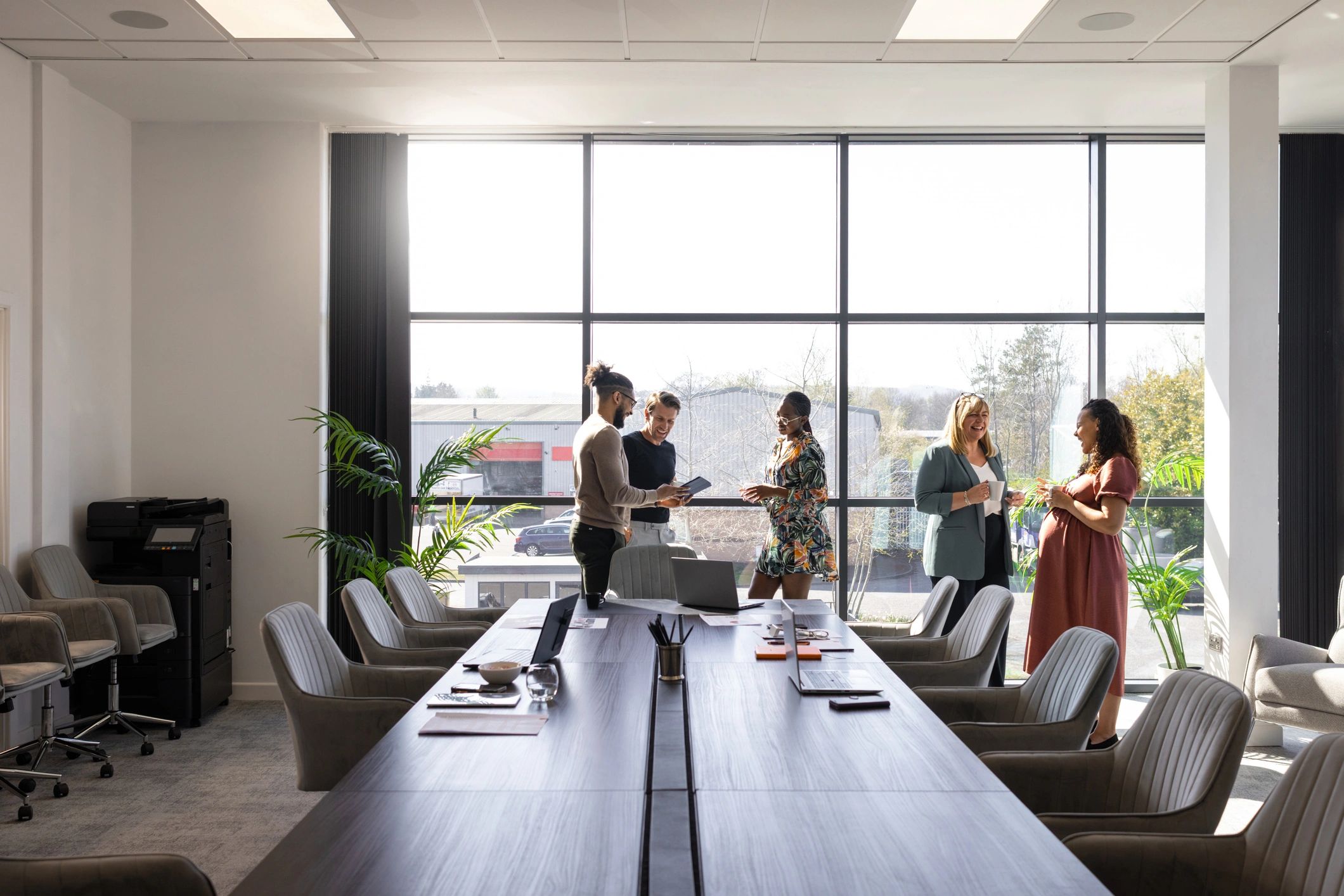 Business consultants collaborating in a modern conference room